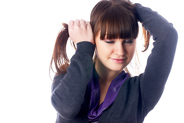 Image showing Woman with hands in hair