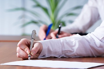 Image showing Writing girl