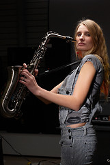 Image showing Woman with saxophone