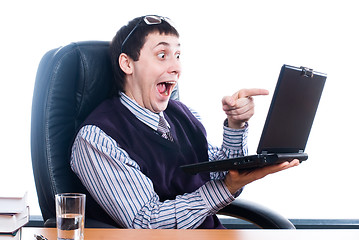 Image showing Young businessman with laptop