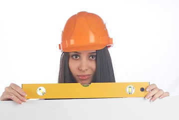 Image showing Woman in helmet wyh level