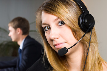 Image showing Beautiful business woman with headset