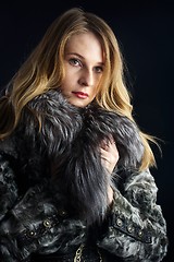 Image showing Attractive woman in fur coat