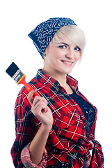 Image showing Young woman with paintbrush