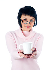 Image showing Young woman with a cup