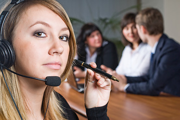 Image showing Beautiful business woman with headset