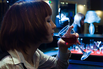 Image showing young women with wine glass