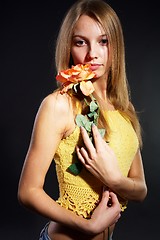 Image showing Pretty girl with flower