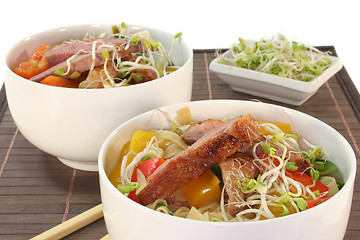 Image showing Duck breast with fried noodles