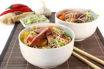 Image showing Duck breast with fried noodles