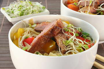 Image showing Duck breast with fried noodles