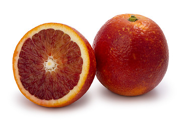 Image showing red moroccan oranges, whole and half