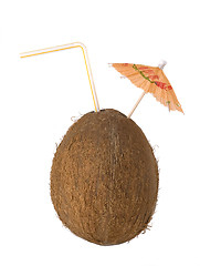 Image showing coconut drink, cocos with a straw and umbrella