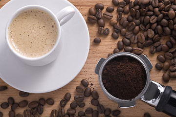 Image showing composition with a cup of coffee and filter holder.