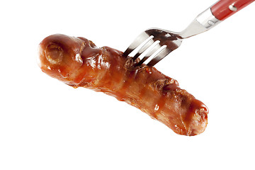 Image showing Fried sausage on a fork