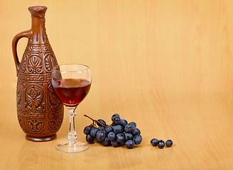 Image showing Artistic composition - crock, glass and grapes