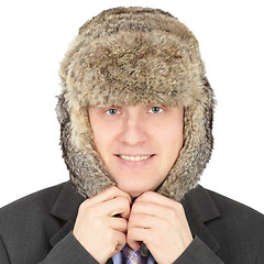 Image showing Russian businessman in fur hat on white background