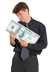Image showing Businessman is nursed with money on white
