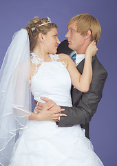 Image showing Romantic groom and bride on lilac background