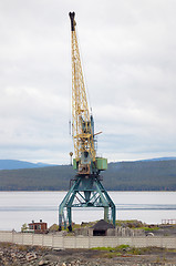Image showing Big port crane on beach