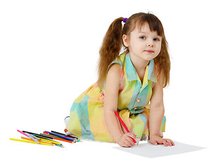 Image showing Child draws with colored pencils