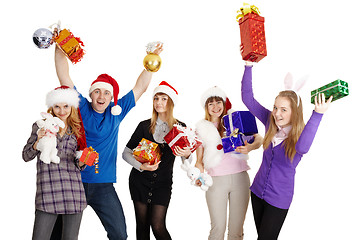 Image showing Happy company with New Year's gifts in hands