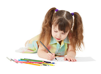 Image showing The child draws crayon drawing