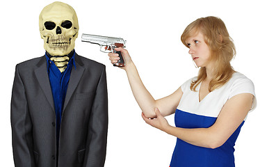 Image showing Woman threatens with pistol to person - skeleton