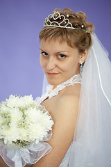 Image showing Portrait of beautiful young woman - bride on violet