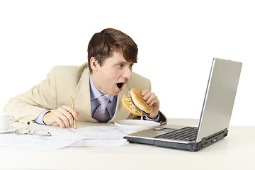 Image showing Young man is going to eat sandwich isolated on white