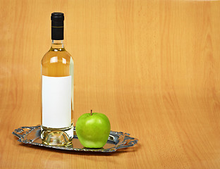 Image showing Still-life - bottle of white wine and green apple