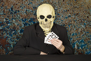 Image showing Horrible cardsharper in mask - skull