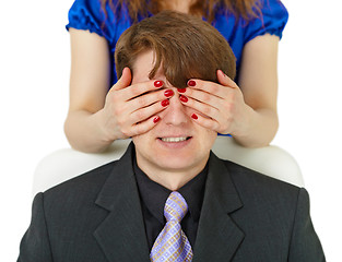 Image showing Woman closed to man of eye by means of hands