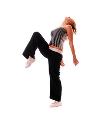 Image showing attractive teenage dancing over white background