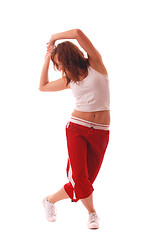 Image showing attractive teenage dancing over white background