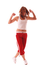 Image showing attractive teenage dancing over white background