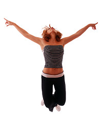 Image showing attractive teenage dancing over white background