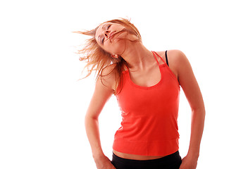 Image showing attractive teenage dancing over white background