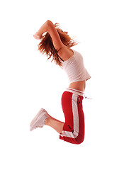 Image showing attractive teenage dancing over white background