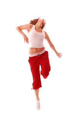 Image showing attractive teenage dancing over white background