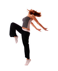 Image showing attractive teenage dancing over white background