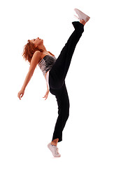 Image showing attractive teenage dancing over white background