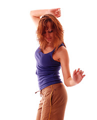 Image showing attractive teenage dancing over white background