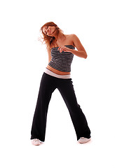 Image showing attractive teenage dancing over white background