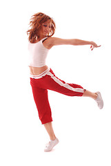 Image showing attractive teenage dancing over white background