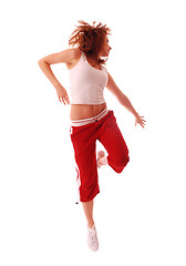 Image showing attractive teenage dancing over white background