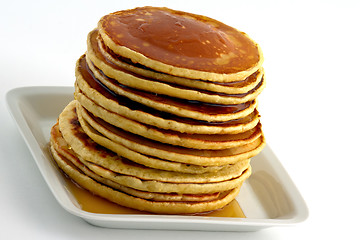 Image showing Stack of pancakes with syrup