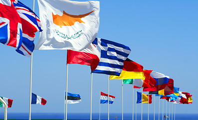 Image showing Flags of the EU against blue sky