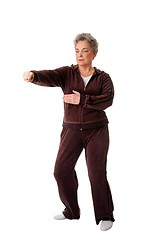 Image showing Senior woman doing Tai Chi Yoga exercise