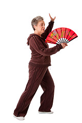 Image showing Senior woman doing Tai Chi Yoga exercise